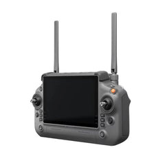 DJI RC Plus controller, angled front view with screen, joysticks and raised antennas