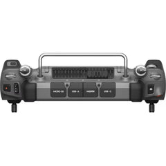 DJI RC Plus controller, edge view showing carrying handle and labeled connection ports