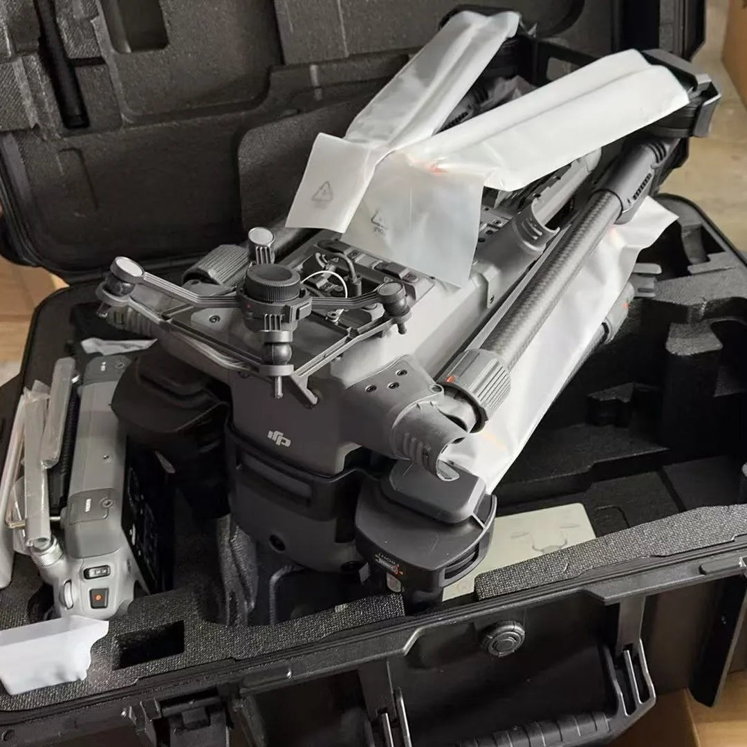 Close-up of folded DJI Matrice 400 with protected propellers inside its carrying case