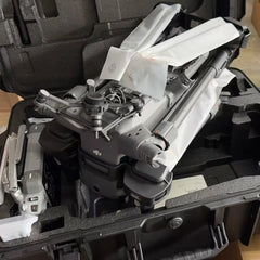 Close-up of folded DJI Matrice 400 with protected propellers inside its carrying case
