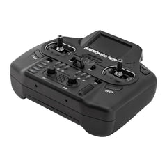 Black RadioMaster GX12 lying at an angle with gimbals and controls visible