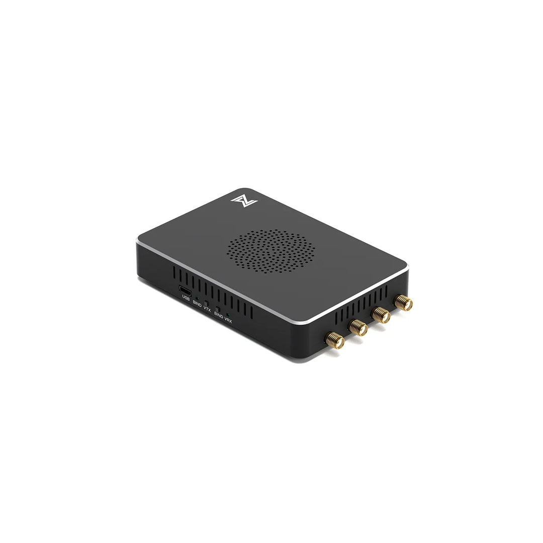 Walksnail Avatar Repeater, angled view without antennas showing side connectors and vents
